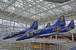 National Naval Aviation Museum - Displaying Two blue planes hanging from ceiling