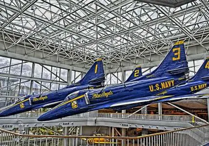 National Naval Aviation Museum - Displaying Two blue planes hanging from ceiling